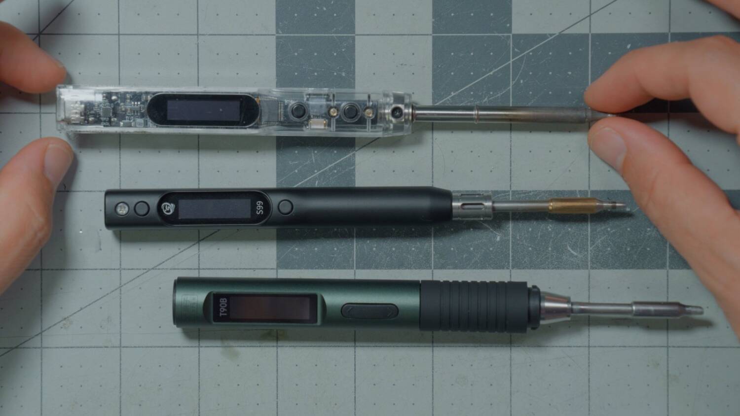 A TS101-style iron, the Sequre S99 and the AlienTek T90B side by side