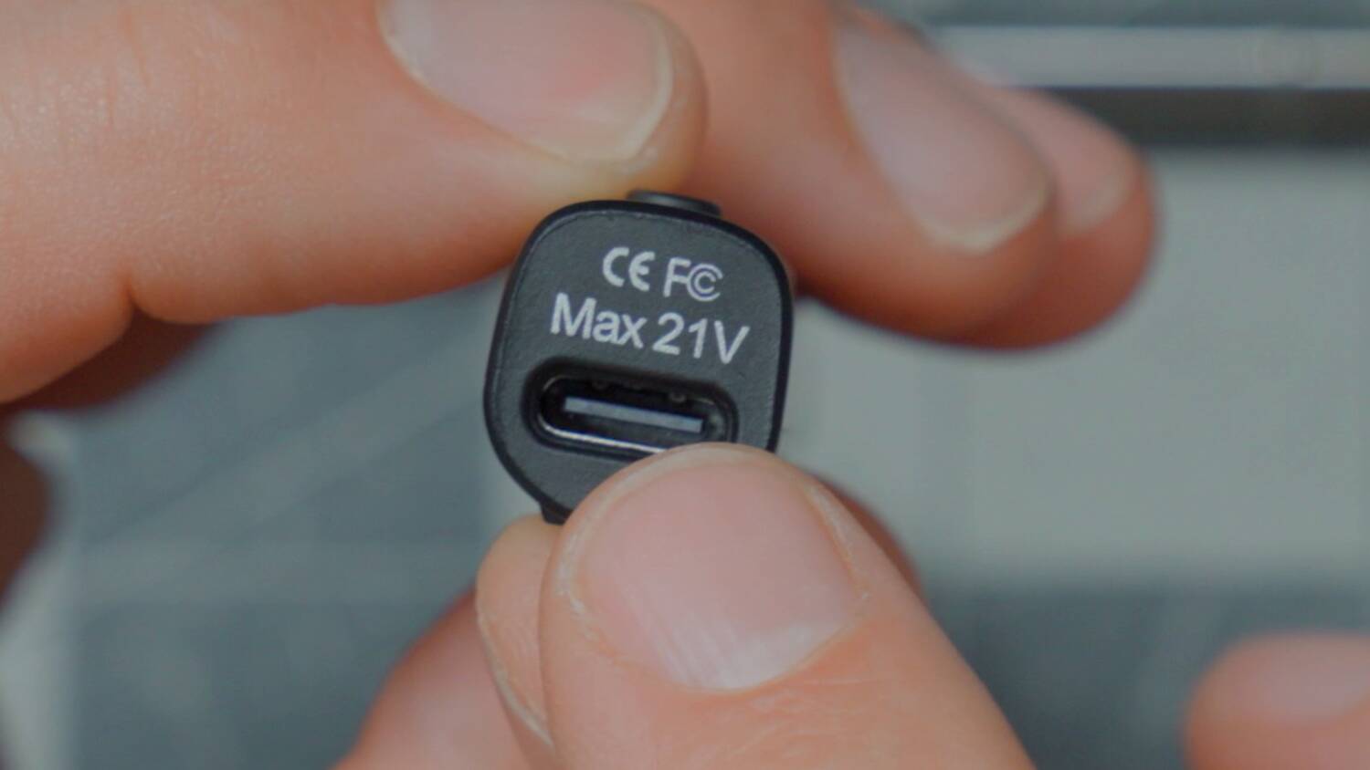 The Sequre S99's USB-C port, marked Max 21V