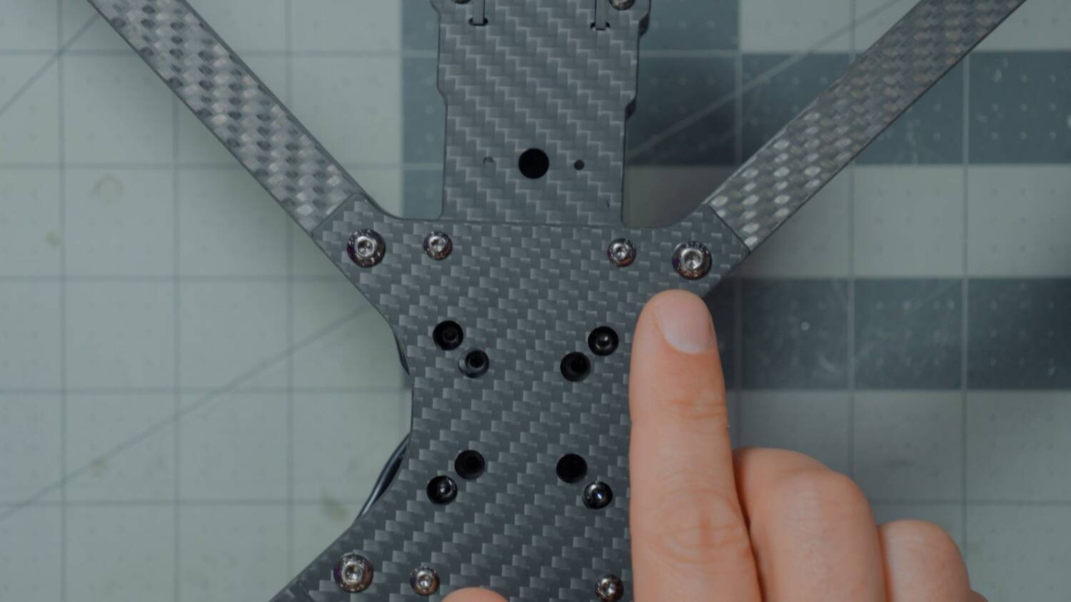 The arm screws and stack screws on the bottom plate