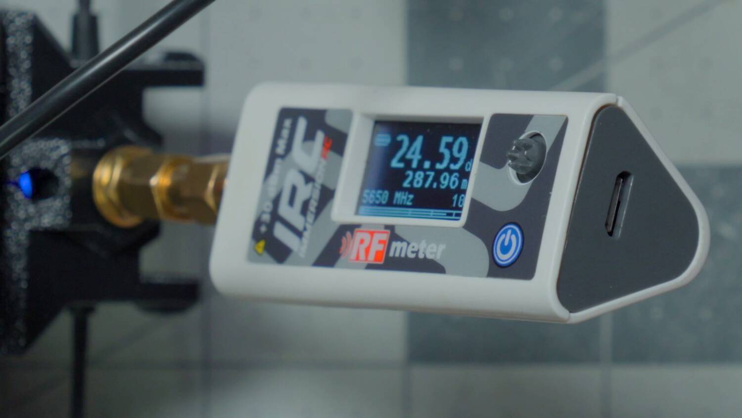 The meter reading 24.59 dBm, about 288mW