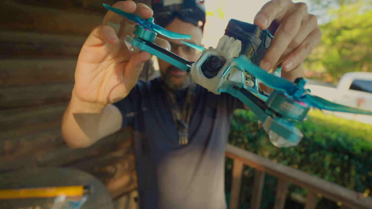 The broken arm, snapped where it enters the aluminum