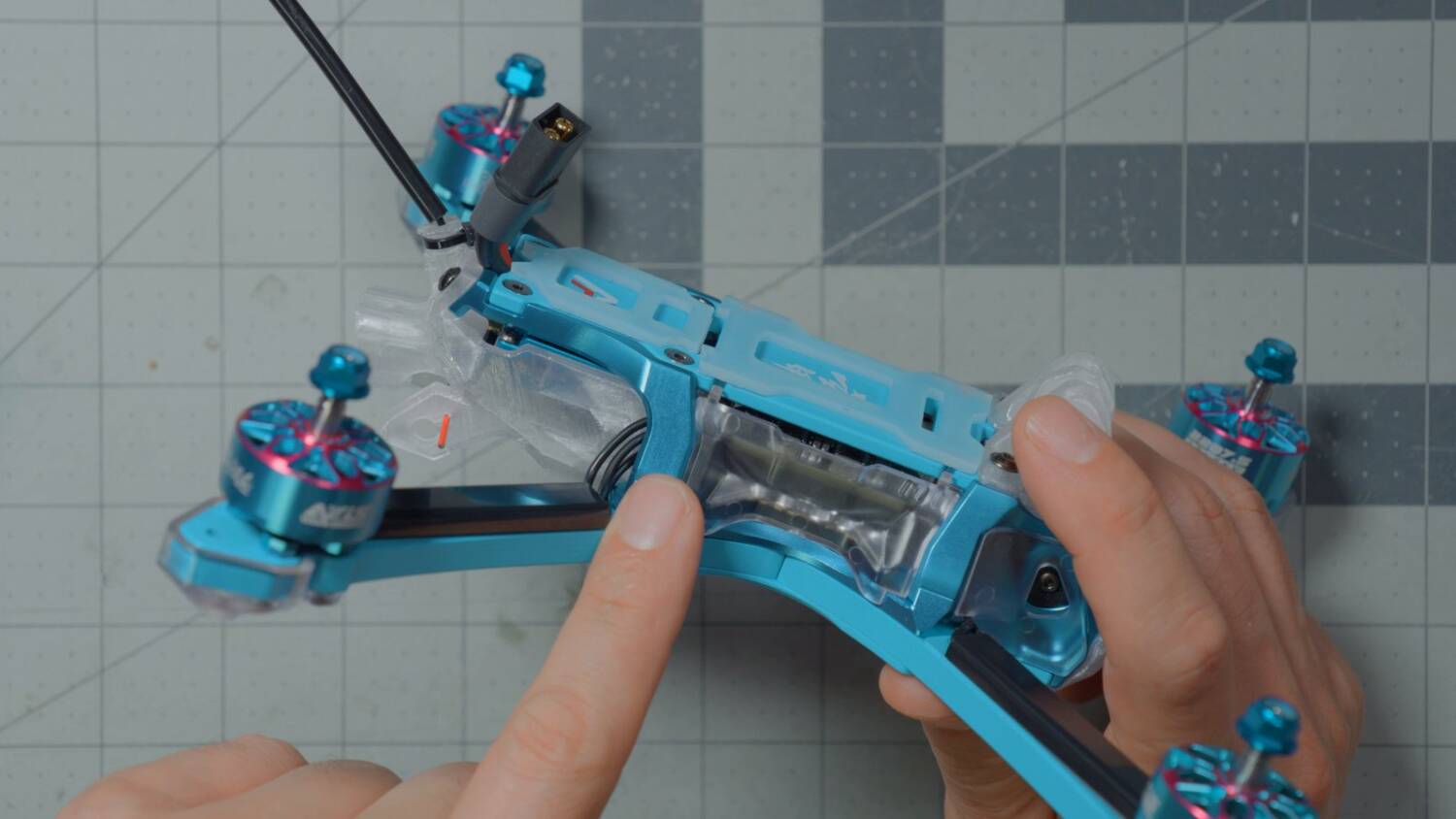 Where the carbon arm enters the aluminum frame