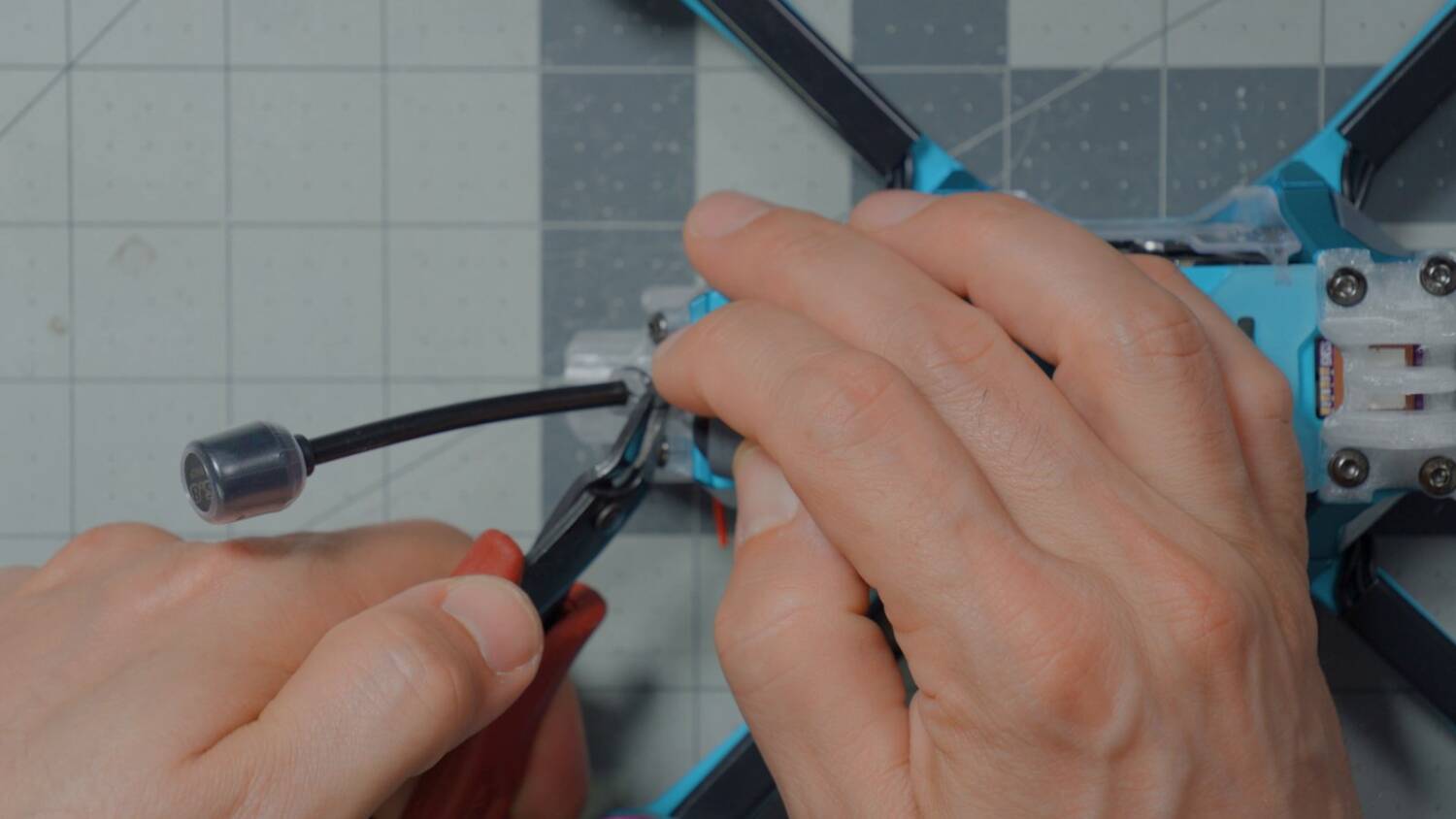 Cutting the zip tie to fit the antenna