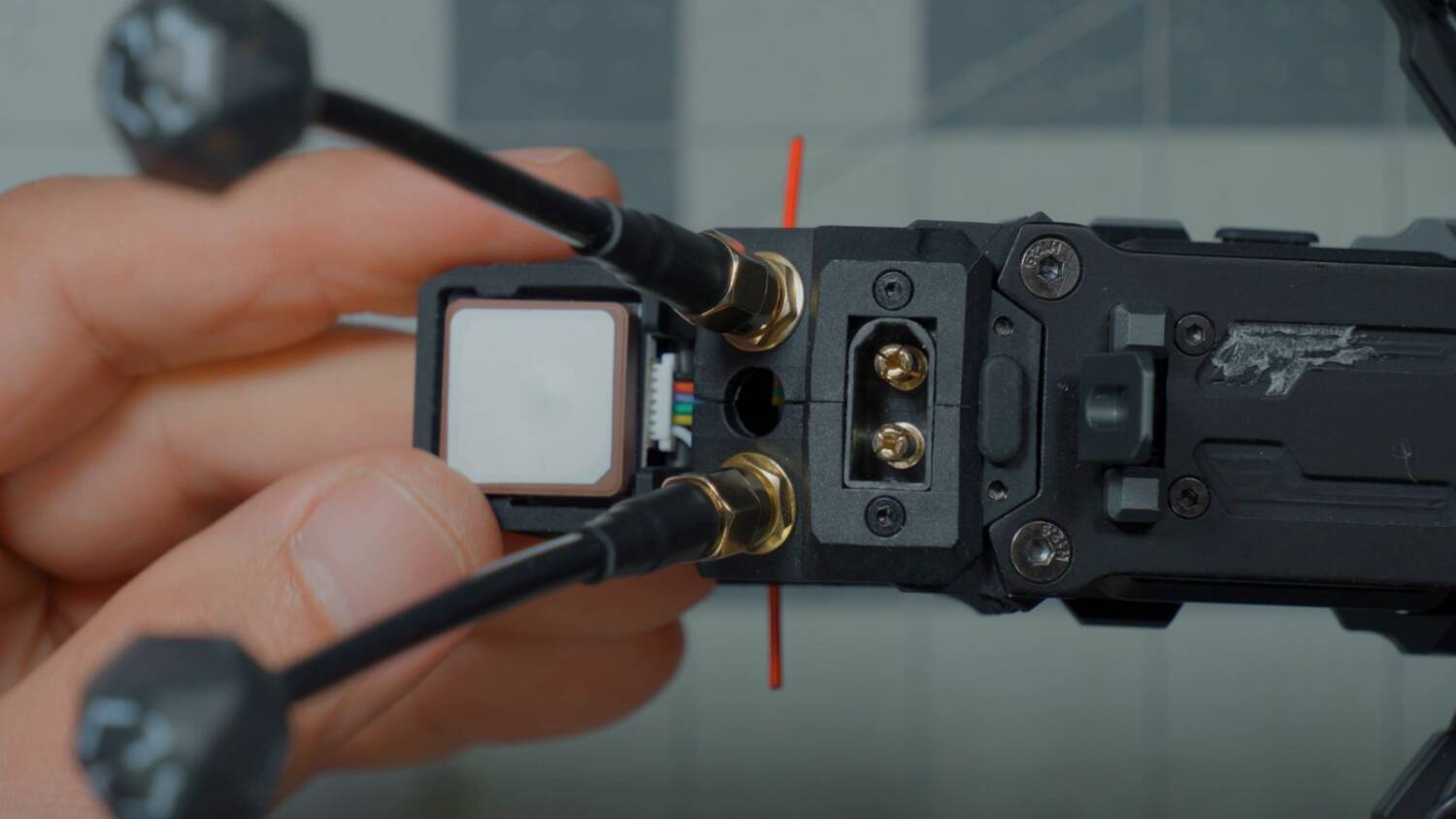The ExpressLRS receiver and GPS at the back