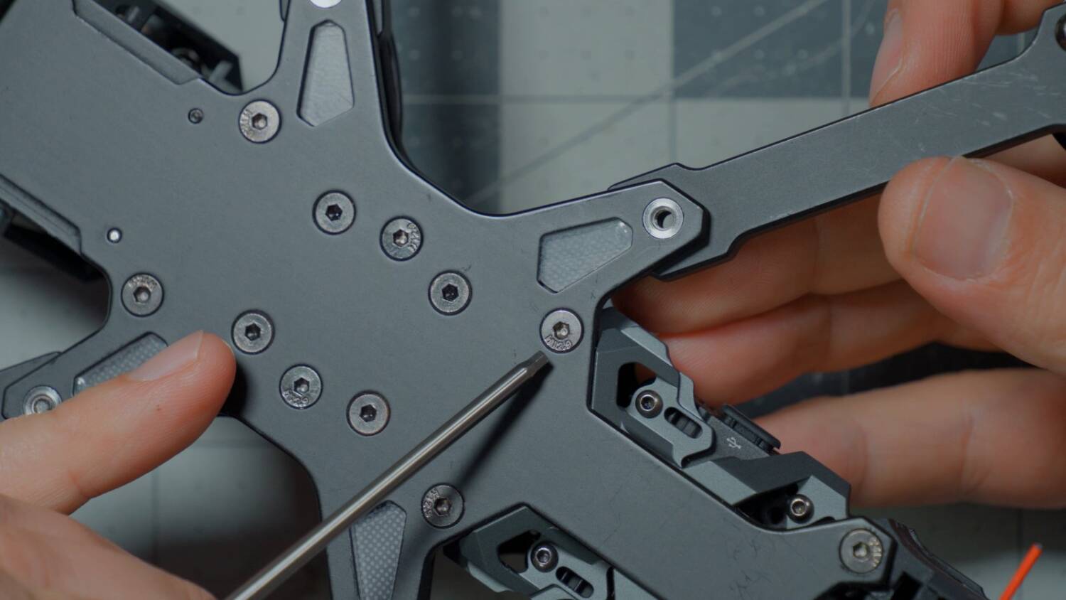 Removing an arm screw