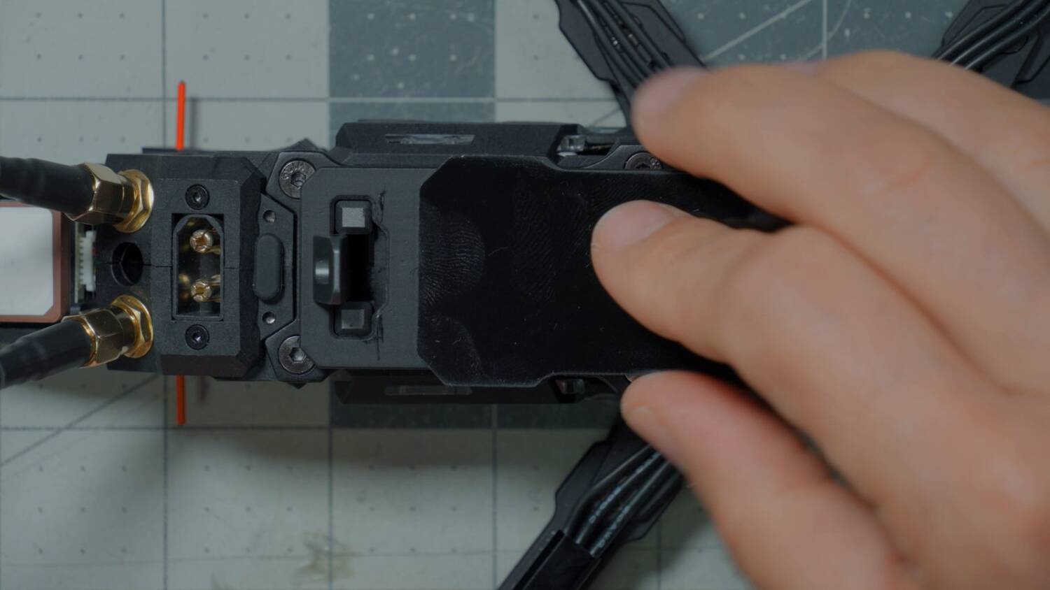 The quick-release battery mount on the frame