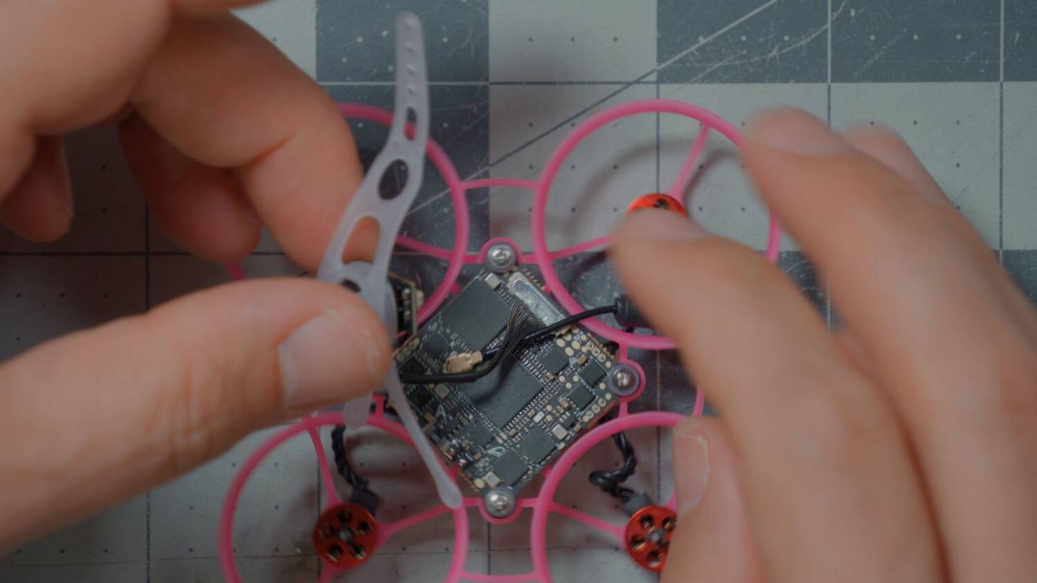Fitting the camera canopy over the flight controller