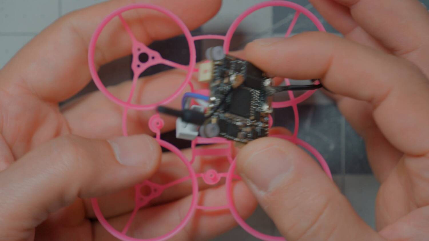 The flight controller in the frame, motor plugs in the way of the battery