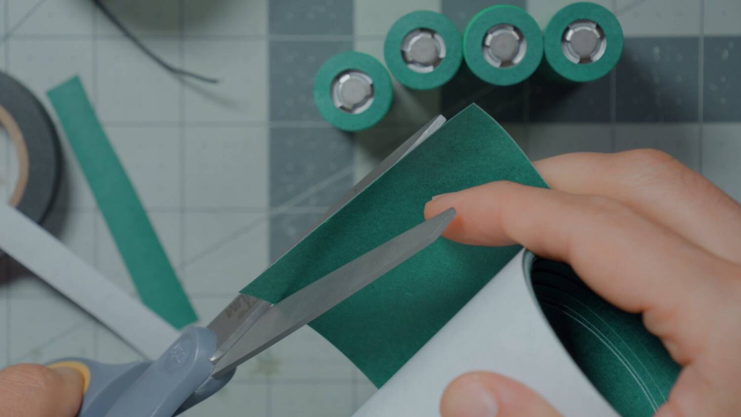 Cutting strips of adhesive fish paper