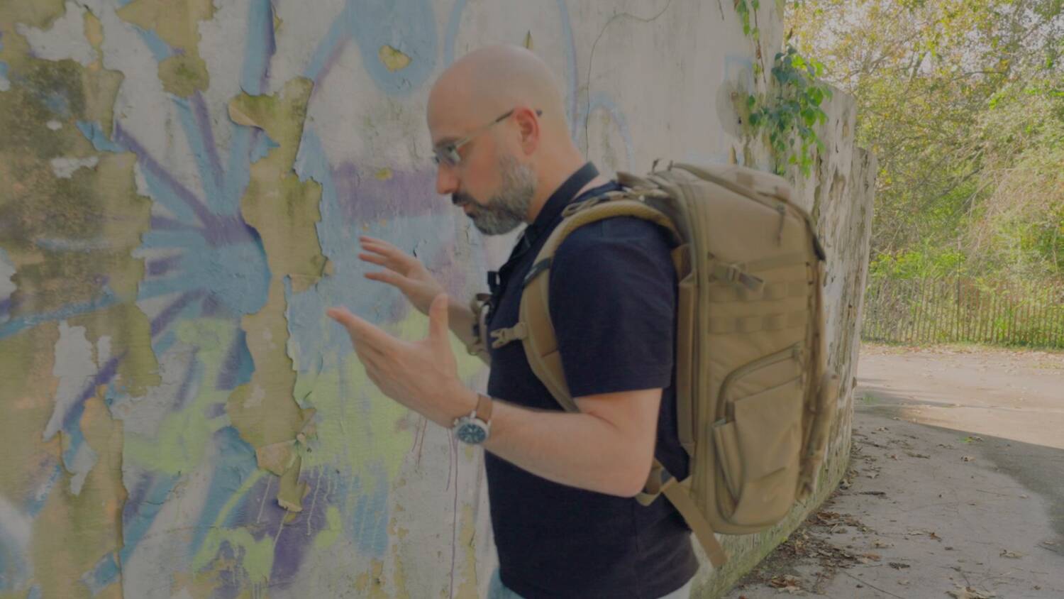 Wearing the loaded backpack