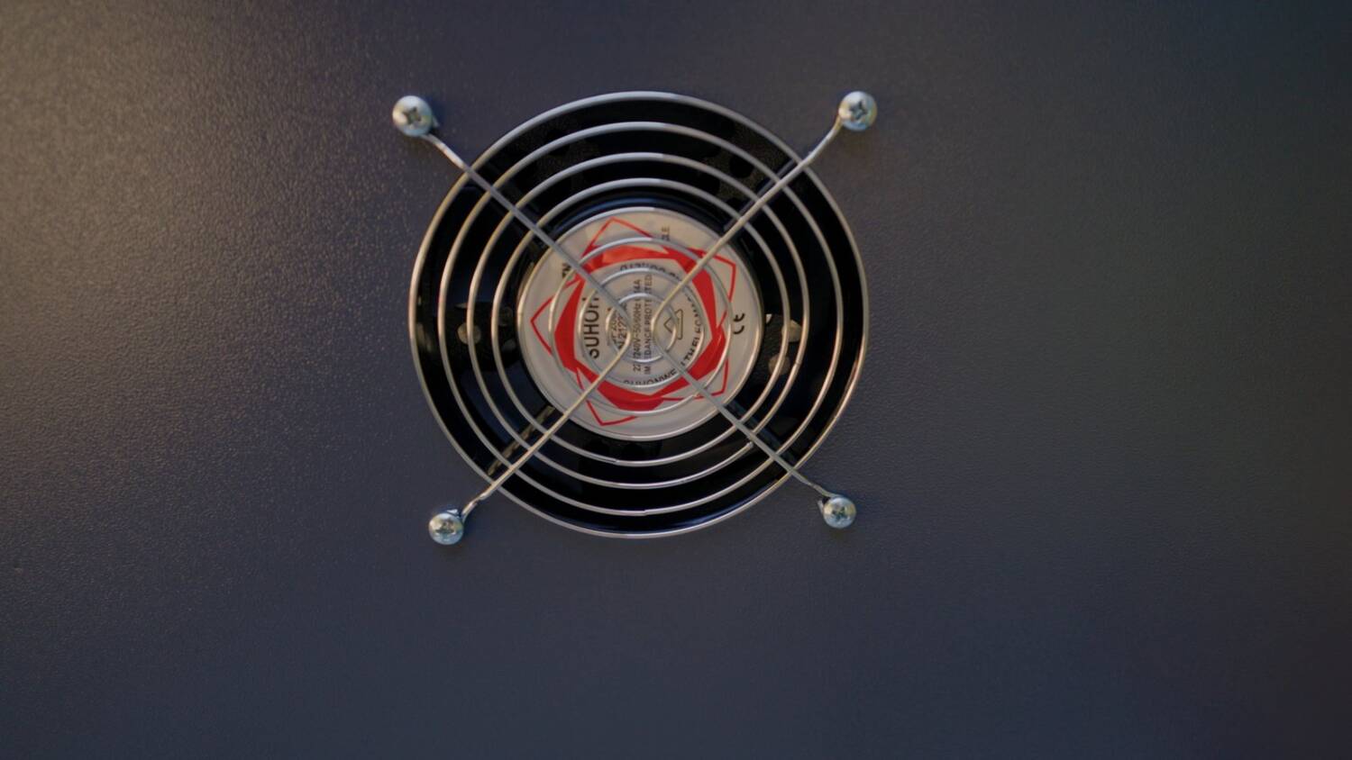 The exhaust fan on the side of the cabinet
