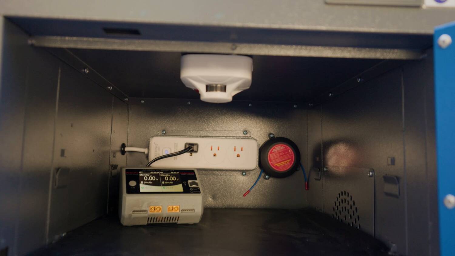 A fire suppression pod and the smoke detector inside